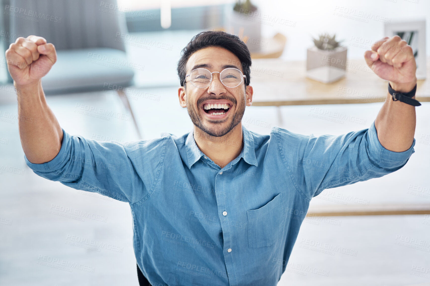 Buy stock photo Success happy and asian businessman in office, celebrating and excited for email, review or loan approval. Hands, celebration and corporate male online winner with emoji, wow or winning gesture