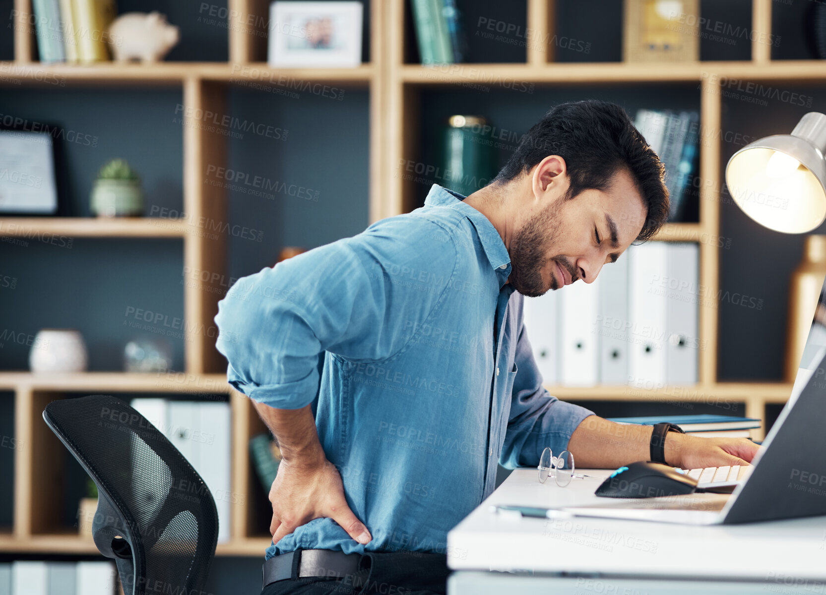 Buy stock photo Back pain, business man and office stress of muscle injury, health risk and backache on desk chair. Uncomfortable worker, spine problem and posture of body, scoliosis and fatigue of corporate burnout