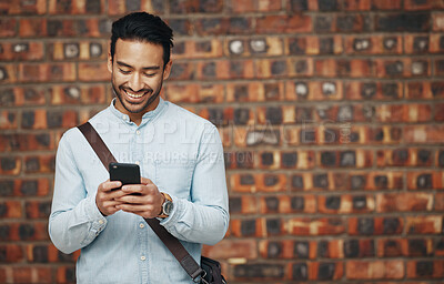 Buy stock photo Employee, startup and man with smartphone, wall and connection with happiness, success and typing. Male entrepreneur, creative and consultant with cellphone, communication and online reading for info
