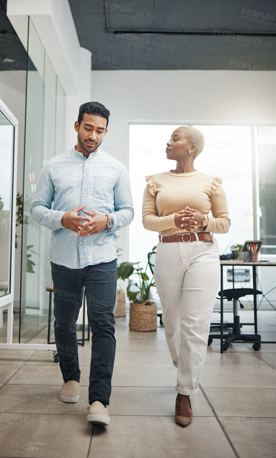 Buy stock photo Business people walking, planning and discussion for startup strategy, project development or management in office. Diversity employees or black woman and partner discussion, advice or talking ideas