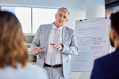 Buy stock photo Senior businessman, presentation and meeting for staff training, coaching or planning by whiteboard at the office. Corporate CEO man presenter in team strategy or teaching employees in group seminar
