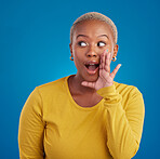 Black woman, gossip and wow secret in studio with hand on face for sale announcement. African female model on a blue background to whisper message, news information or rumor  about discount mockup