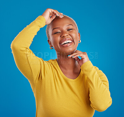 Buy stock photo Happy, portrait and black woman in studio smile, cheerful and laughing on mockup, space or blue background. Face, joy and female laugh, joke and silly humor, carefree and having fun while isolated