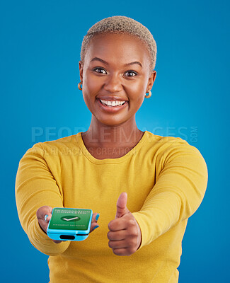 Buy stock photo Phone screen, payment and woman thumbs up for transaction success in e commerce, online shopping and mobile app. Yes, like and thank you sign of black person, machine and fintech check mark in studio