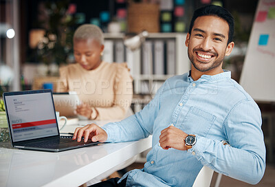 Buy stock photo Portrait, smile and business man in office with pride for career, occupation or job. Ceo, night and happy, proud or confident Asian professional accountant sitting at table with laptop in company.
