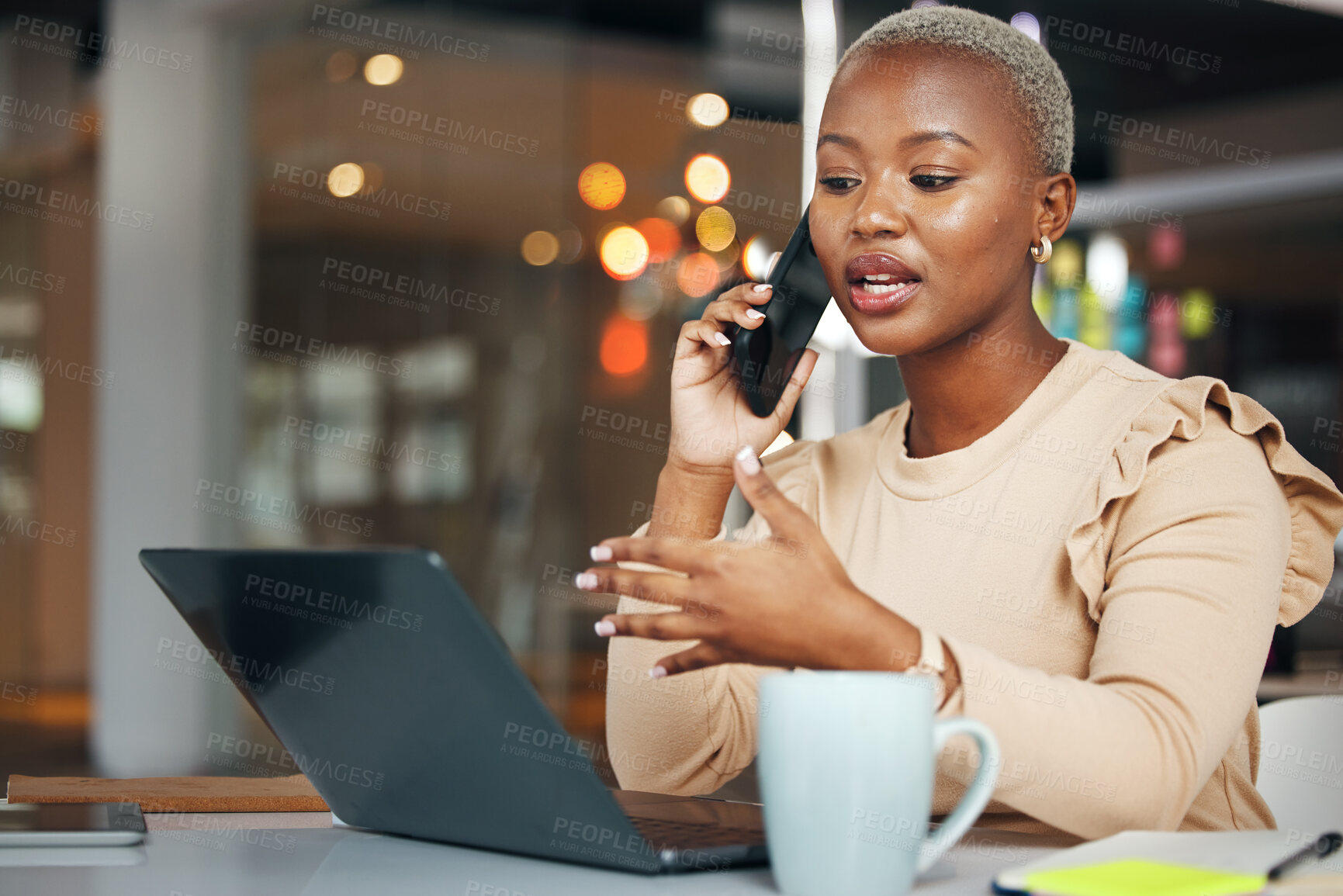 Buy stock photo Phone call, business and black woman talking in office, chatting or speaking to contact. Laptop, cellphone and female professional in conversation, networking or discussion with smartphone at night.