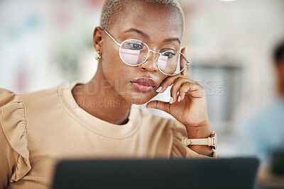 Buy stock photo Office, laptop and black woman, serious and reading email or online research report, with glasses. Computer, concentration and African journalist proofreading article on digital news website or blog