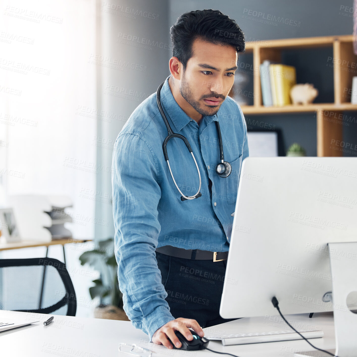 Buy stock photo Serious, man doctor and computer research, healthcare innovation and planning online. Medical worker, desktop technology and reading data of test results, wellness management and telehealth database