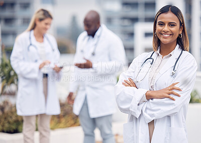 Buy stock photo Healthcare, happy and portrait of a doctor with arms crossed for medicine in the city. Smile, pride and a female Indian medical worker with confidence and empowerment in professional medicare