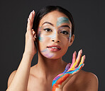 Beauty, art and face paint, portrait of woman with creative makeup and self expression. Skincare, creativity and color in artistic cosmetics, aesthetic and freedom to express for young beautiful girl