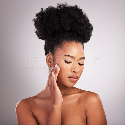 Buy stock photo Skincare, beauty and black woman with hand on face, white background and cosmetics. Health, dermatology and natural makeup and African model in studio space for healthy skin care and wellness.