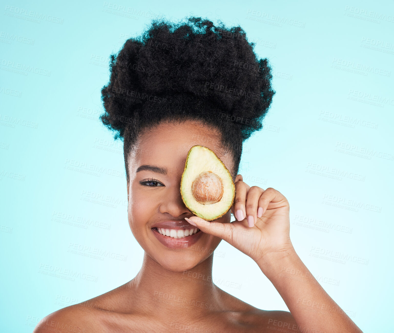 Buy stock photo Avocado, happy skincare and woman portrait of beauty, wellness and detox healthcare. Isolated, blue background and studio with a young female smile from healthy fruit food with vitamin for glow