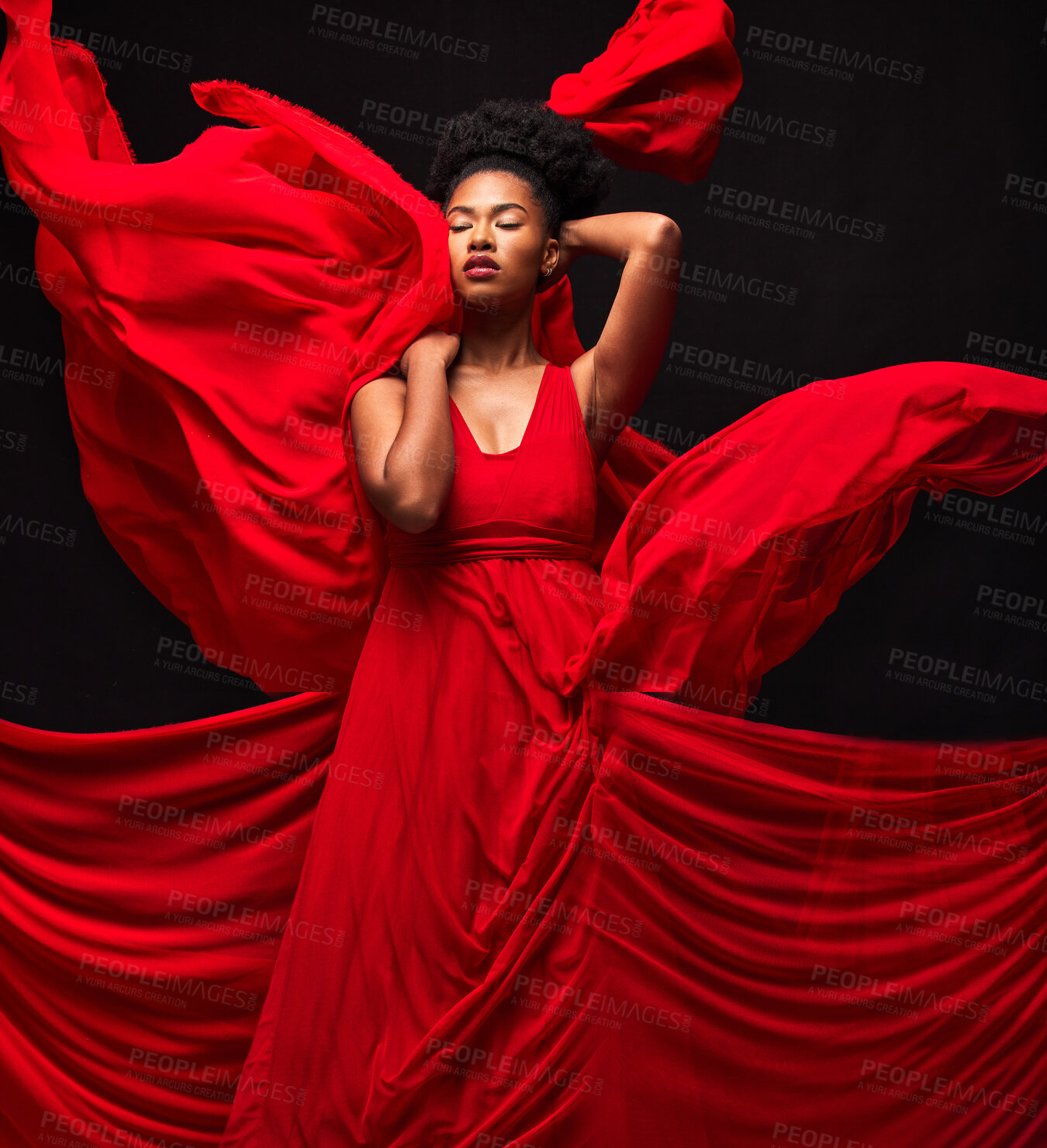 Buy stock photo Black woman, art and fashion, red fabric on dark background with motion and aesthetic movement. Flowing silk, fantasy and artistic beauty, stylish African model in creative designer dress in studio.