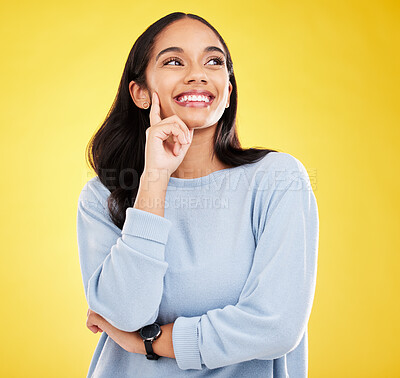 Buy stock photo Yellow background, thinking and face of woman with smile for advertising, promotion and mockup space. Ideas, thoughtful and isolated girl in studio with happy mindset, positive attitude and confident