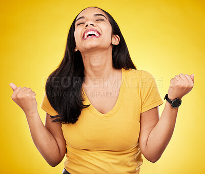 Buy stock photo Woman, happy and fist of winner in studio for celebration, achievement deal and lotto success. Excited female model celebrate winning prize on yellow background for lottery, bonus victory and smile 