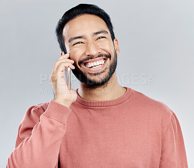 Buy stock photo Young asian man, phone call and happy in studio for communication, networking and gray background. Student male model, smartphone and excited smile for chat, listening and conversation with happiness