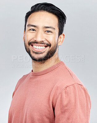 Buy stock photo Portrait, smile and happy Asian man in studio isolated on a gray background or backdrop. Face, fashion and young, confident and handsome male model from Singapore smiling, joy and positive mindset.
