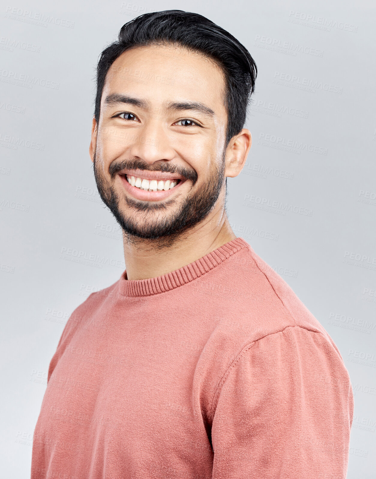 Buy stock photo Portrait, smile and happy Asian man in studio isolated on a gray background or backdrop. Face, fashion and young, confident and handsome male model from Singapore smiling, joy and positive mindset.