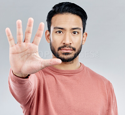 Buy stock photo Portrait, five and hand for stop, Asian man and warning with serious expression against a grey studio background. Face, Japanese male and guy with gesture for halt, raising palm and showing number