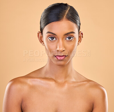Buy stock photo Beauty, face and portrait of woman in studio for skincare, cosmetics, dermatology or makeup. Aesthetic female 
serious about self care, natural skin and spa facial shine results on a brown background