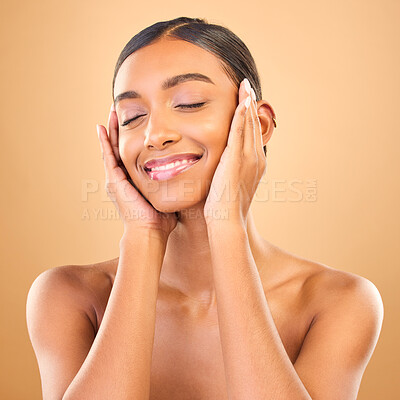 Buy stock photo Hands on face, beauty and smile of woman in studio for skincare, cosmetics, dermatology or makeup. Aesthetic female with soft skin for self care, natural facial and shine results on brown background
