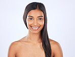 Woman, hair and beauty and haircare in portrait with smile, cosmetic care and keratin treatment on studio background. Happy, Indian female with hairstyle and skin glow, Brazilian and cosmetics