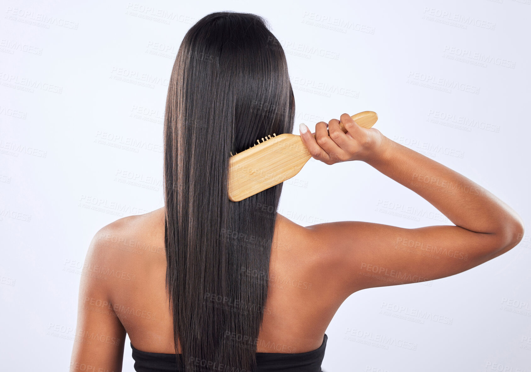Buy stock photo Woman brush hair, beauty with cosmetics, haircare with keratin treatment and back on studio background. Female with straight hairstyle and skin glow, Brazilian and cosmetic care, growth and strong