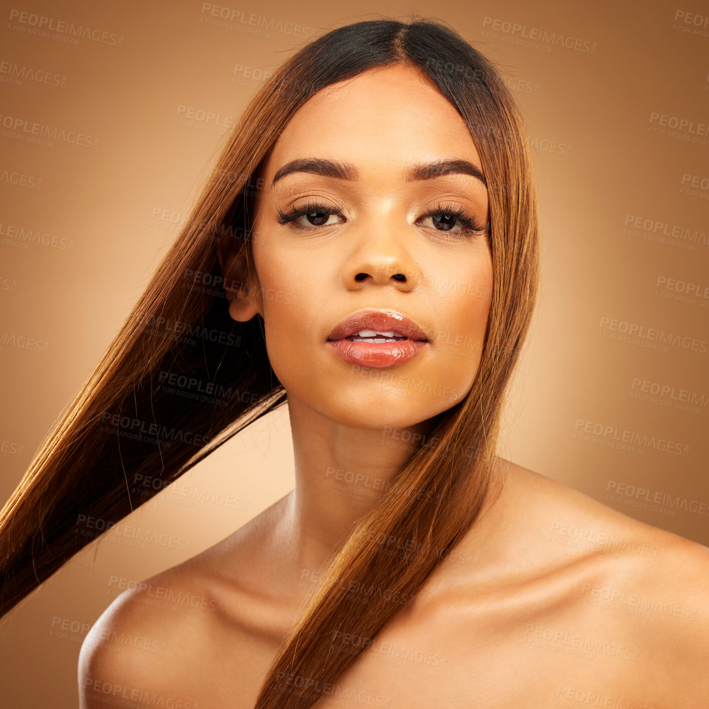 Buy stock photo Haircare, beauty and serious portrait of woman in studio with straight hair, texture and salon shine. Latino model, healthy brunette hairstyle and natural keratin product on brown background space.