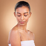 Beauty, makeup and face of Indian woman for wellness, skincare glow and facial treatment in studio. Dermatology, luxury spa mockup and isolated serious girl with healthy skin, cosmetics and confident