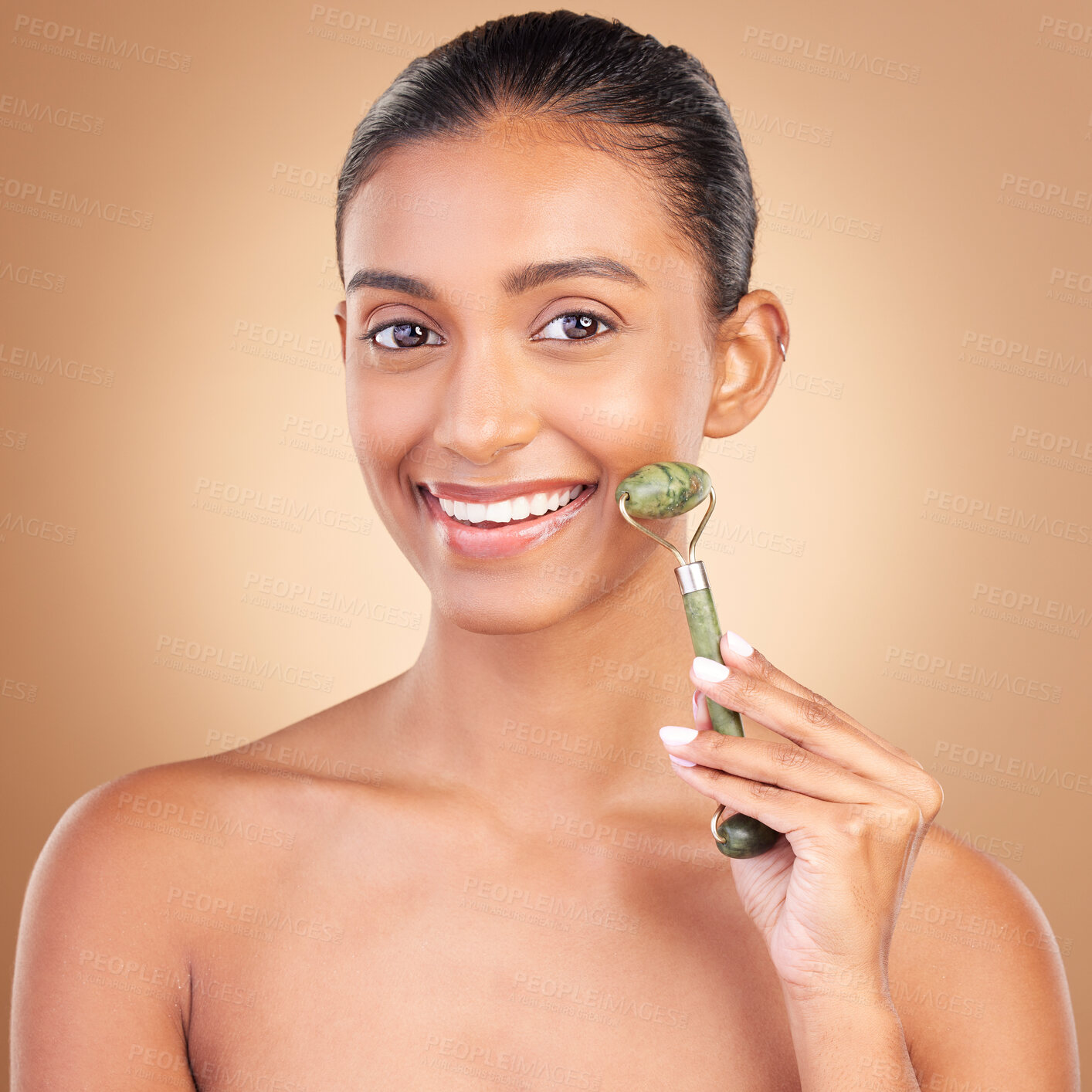 Buy stock photo Woman, beauty and derma roller with face, happiness with facial massage and skincare on studio background. Cosmetic tools, healthy skin glow and female smile in portrait, jade quartz and crystal