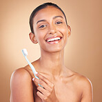 Beauty, smile and toothbrush with portrait of indian woman in studio for brushing teeth, dental and cosmetics. Oral hygiene, clean and self care with model on brown background for routine and health 