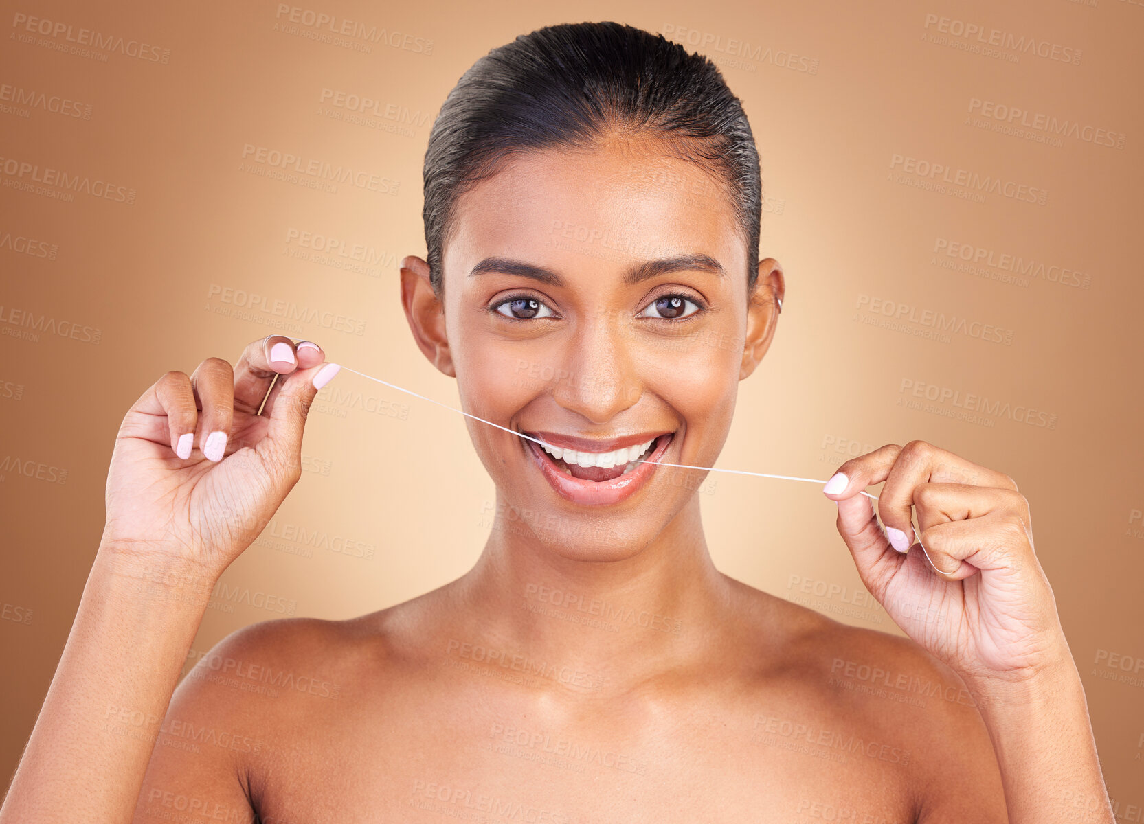 Buy stock photo Floss, studio and portrait of a woman with healthcare, cleaning and dental health. Isolated, brown background and young female model with happiness from clean teeth and mouth wellness with a smile