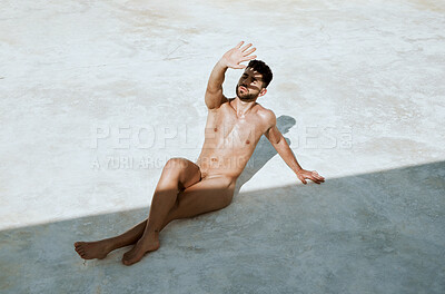 Buy stock photo Shade, sun and man in the nude for summer, artistic and sitting for tanning. Relax, sexy and a naked guy covering from the sunshine while getting a tan on vacation, relaxing and enjoying the weather