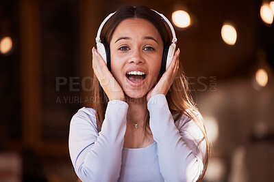 Buy stock photo Woman, portrait or surprise music headphones in cafeteria, restaurant or coffee shop in studying break, rest or relax singing. Face, shocked or student listening to audio, radio or university podcast