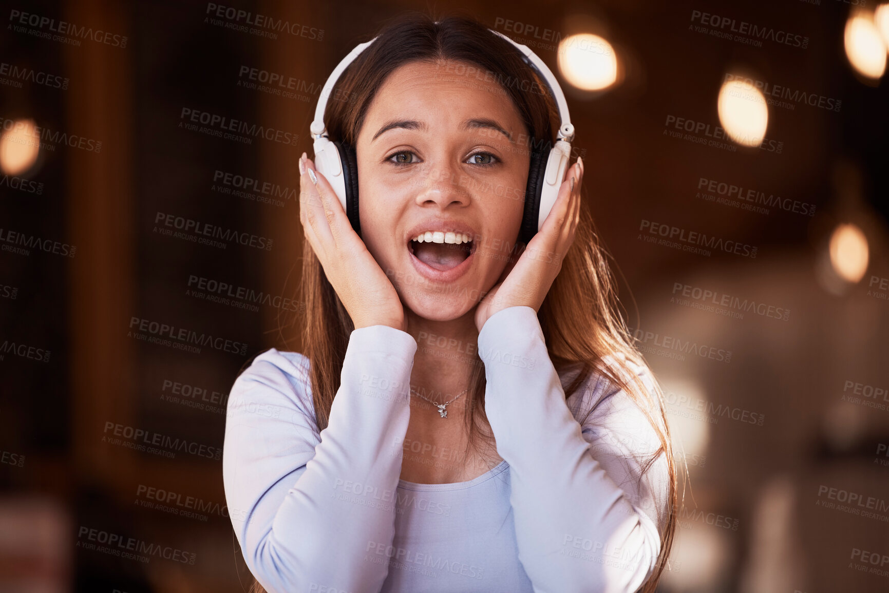 Buy stock photo Woman, portrait or surprise music headphones in cafeteria, restaurant or coffee shop in studying break, rest or relax singing. Face, shocked or student listening to audio, radio or university podcast