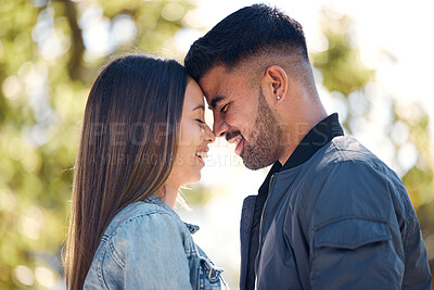 Buy stock photo Couple, happy and outdoor with a smile for love, care and happiness together in summer. Head of young man and woman at nature park for affection on romantic valentines day date or vacation to relax