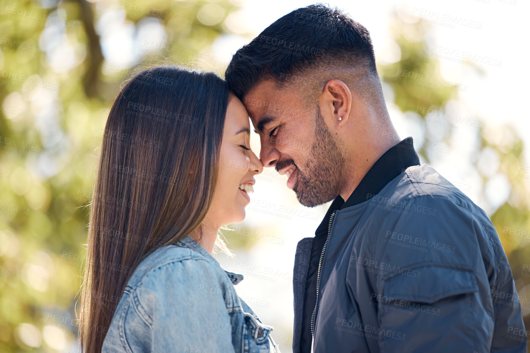 Buy stock photo Couple, happy and outdoor with a smile for love, care and happiness together in summer. Head of young man and woman at nature park for affection on romantic valentines day date or vacation to relax