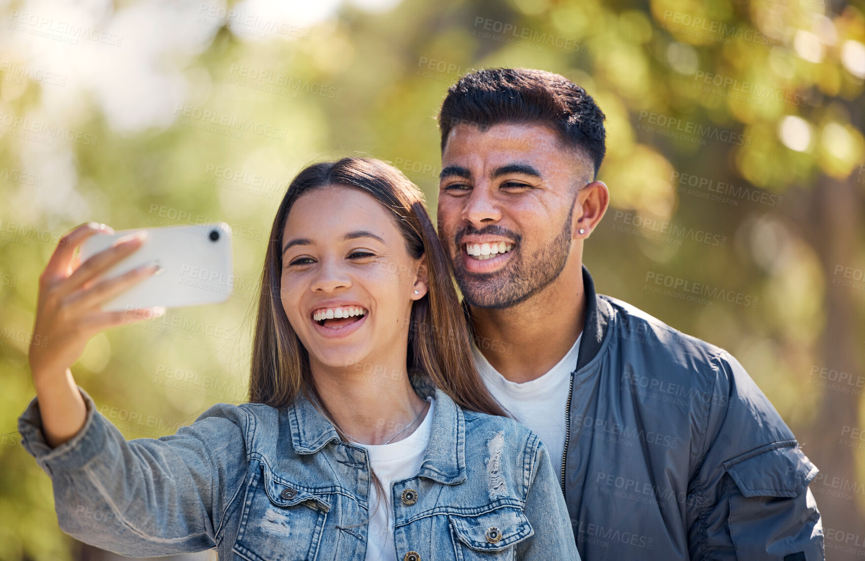 Buy stock photo Couple, outdoor and selfie with a smile for love, care and happiness together in summer. Young man and woman at nature park for a profile picture on a happy and romantic date or vacation to relax