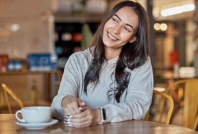 Buy stock photo Thinking, happy and a woman waiting in a coffee shop, sitting at a table to relax over the weekend. Idea, cafe and smile with an attractive young female sitting in a restaurant feeling thoughtful