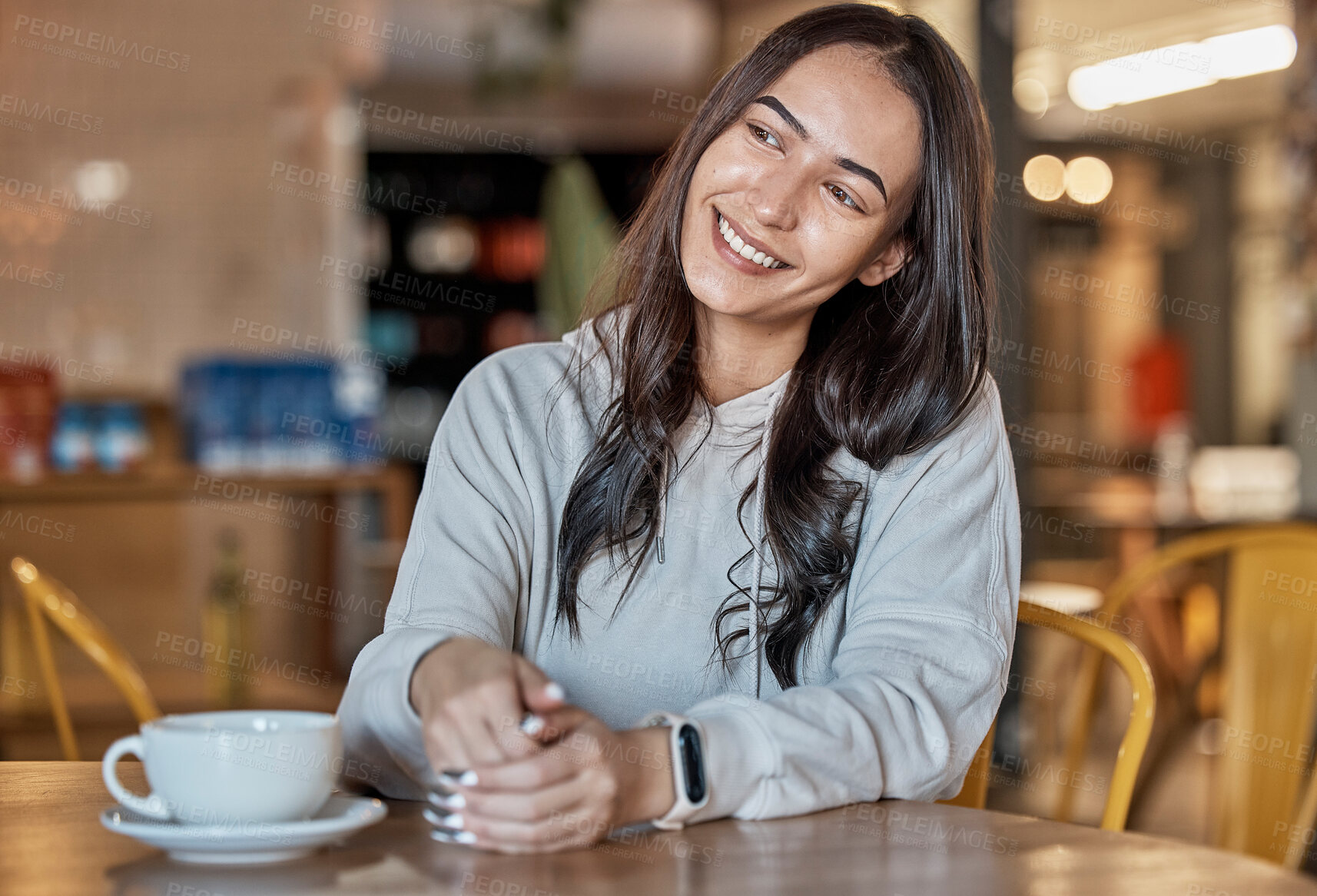 Buy stock photo Thinking, happy and a woman waiting in a coffee shop, sitting at a table to relax over the weekend. Idea, cafe and smile with an attractive young female sitting in a restaurant feeling thoughtful