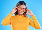 Fashion glasses, teen portrait and happy woman with casual clothes, luxury designer brand or outfit style. Gen z summer aesthetic, teenager face smile and young female model on blue background studio