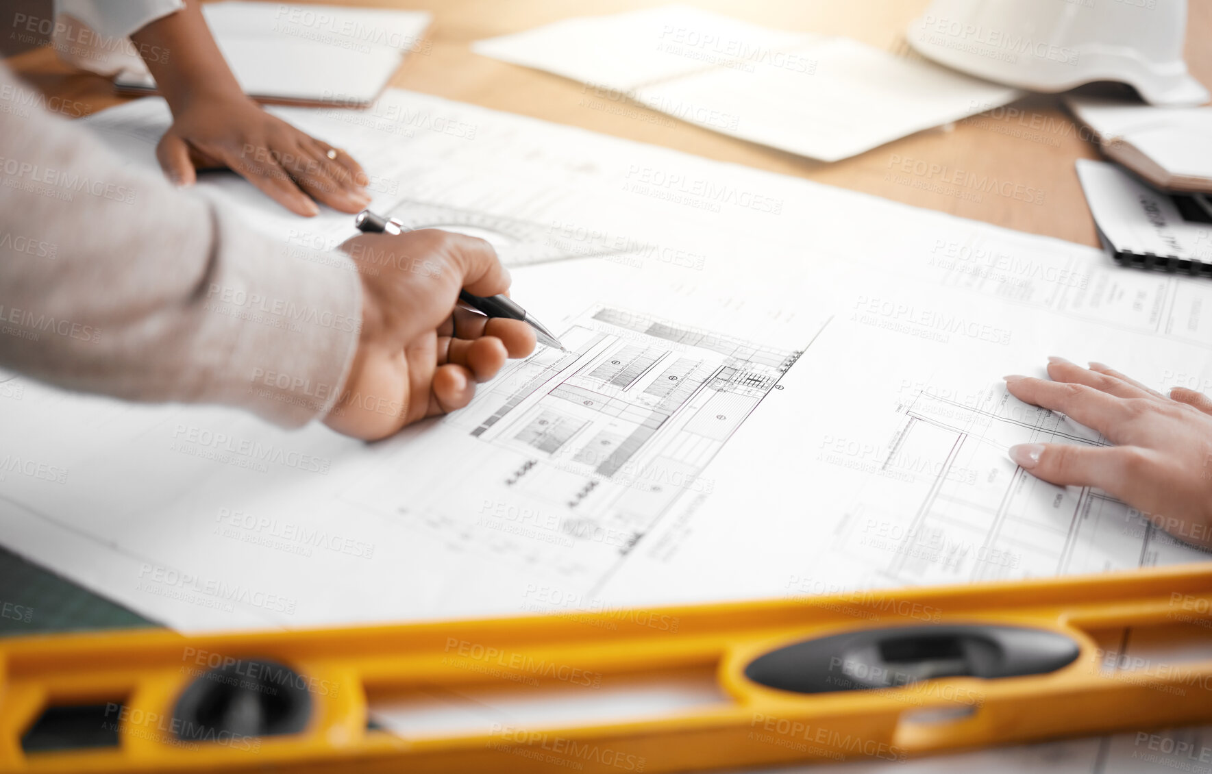 Buy stock photo Hands, collaboration and planning with an architecture team working in their office on design from above. Teamwork, construction or blueprint with an architect, designer and engineer at work together