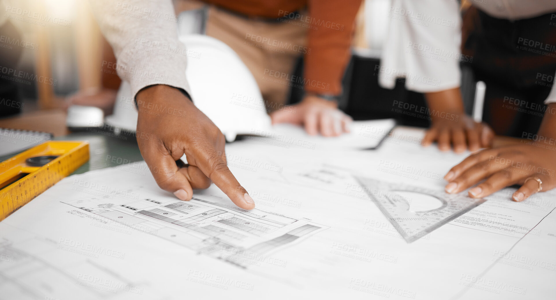 Buy stock photo Hands, collaboration and design with a building team working in their office on architecture from above. Teamwork, construction or blueprint with an architect, designer and engineer at work together