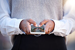 Woman, hands and phone typing in communication, social media or business chat in the outdoors. Closeup hand of female employee chatting on mobile smartphone with 5G connection for networking outside