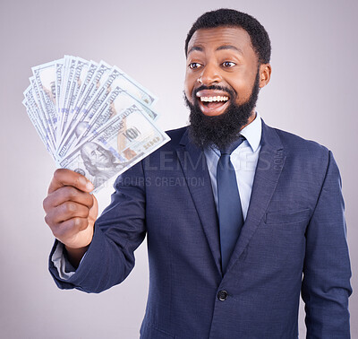 Buy stock photo Wow, cash and investment with a business black man in studio on a gray background as a lottery winner. Money, accounting and finance with a male employee holding dollar bills for the economy