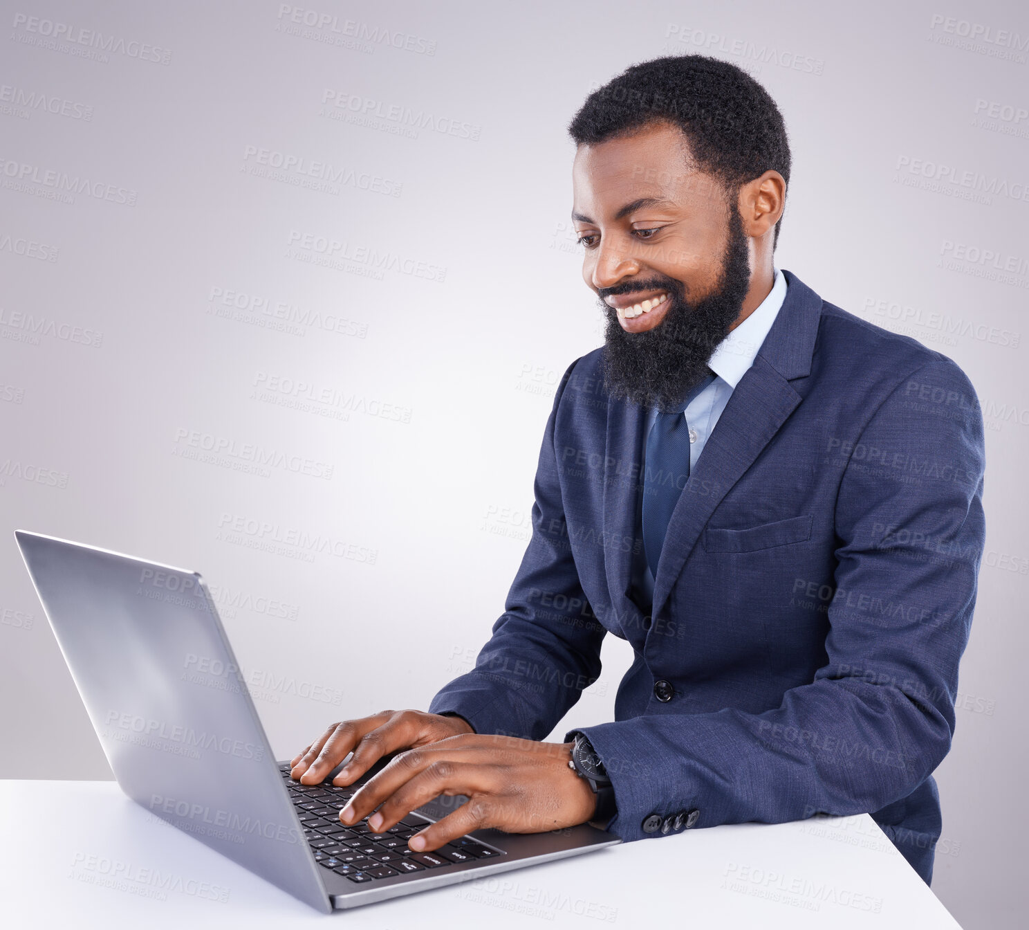 Buy stock photo Happy black man, business and laptop in studio for planning, corporate research and internet. Male employee, computer typing and background for website connection, online stocks and digital trader 