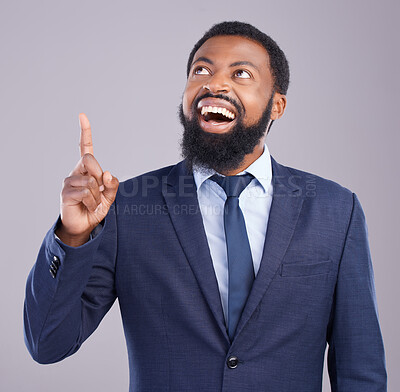 Buy stock photo Wow, pointing and announcement with a business black man in studio on a gray background for motivation. Winner, hand gesture and promotion with a corporate male employee celebrating success
