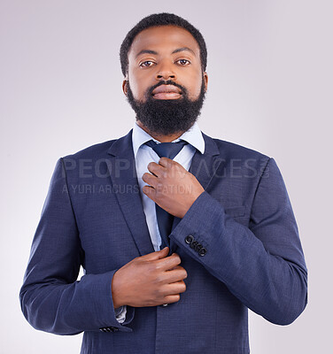 Buy stock photo Portrait, business and black man fixing tie in studio isolated on a gray background. Ceo, entrepreneur and confident, proud or serious male professional from South Africa with pride for career or job