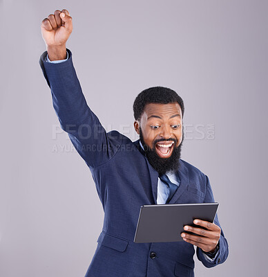 Buy stock photo Winner black man on tablet isolated on gray background for stock market, trading and business bonus, fist pump and success. Yes, wow and power of person with winning news or digital profit in studio