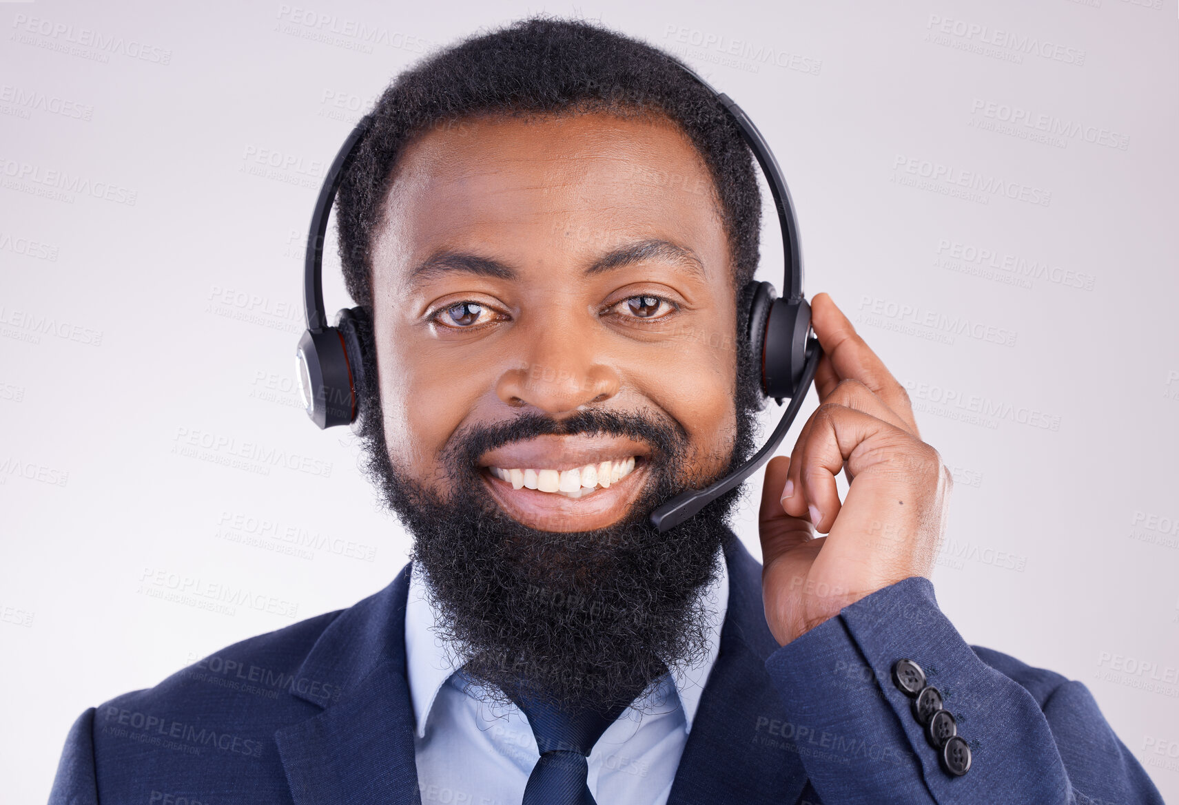 Buy stock photo Call center, microphone and portrait of man, studio and consulting questions for customer service. Happy black male, telemarketing consultant and contact us for telecom sales, smile and crm advisory 